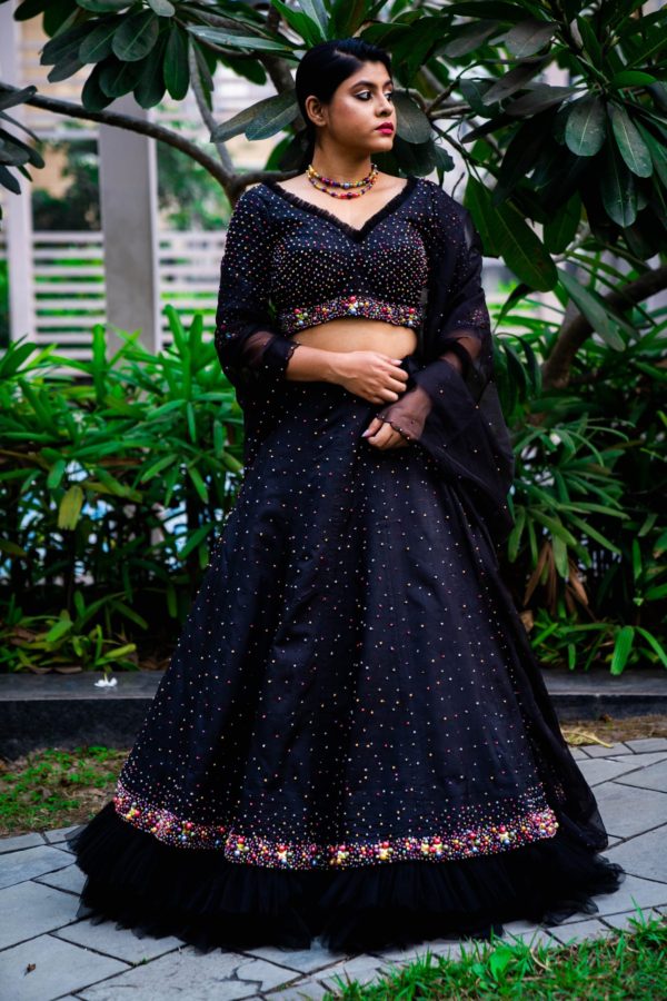 Sequined and bead worked black lehenga and embellished blouse and dupatta best for cocktail reception