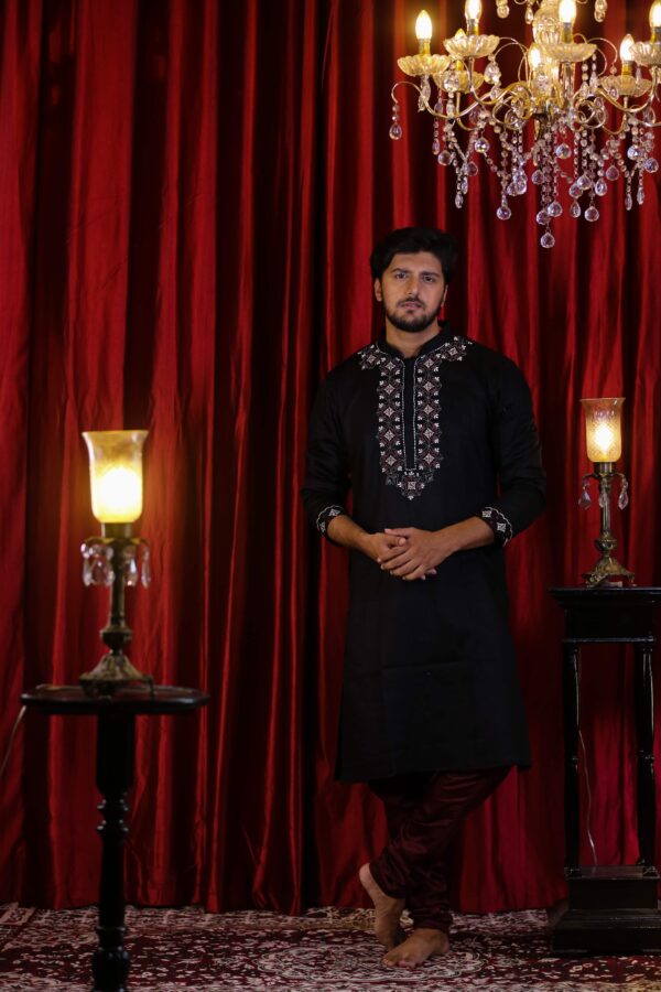 black Kurta with red and white embroidery by black in vogue