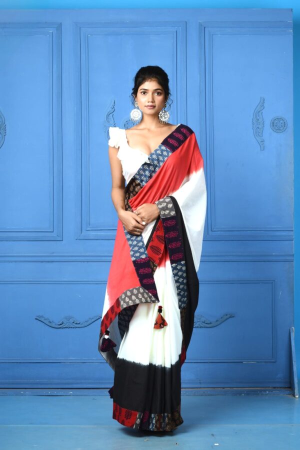 white cotton saree with red & black dye and applique work border